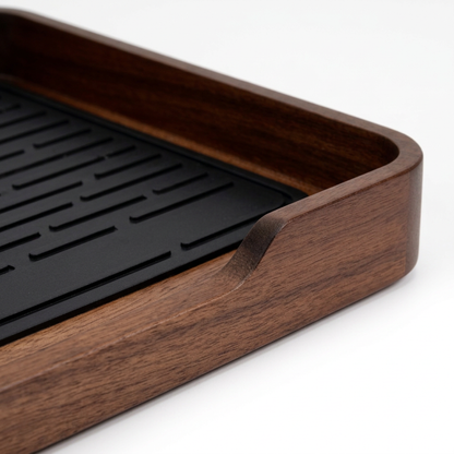 Close-up of brown wood-look frame and rounded tray corner