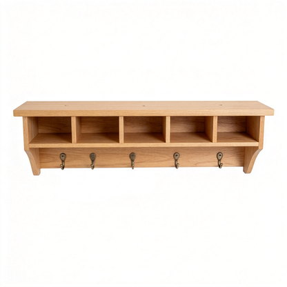 Empty wall coffee organizer with five cubbies and five hooks on white background